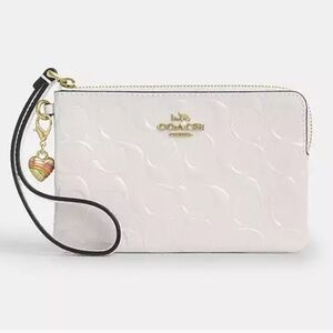 Coach Corner Zip Wristlet
In Signature Leather With Heart Charm Gold/Chalk NWT